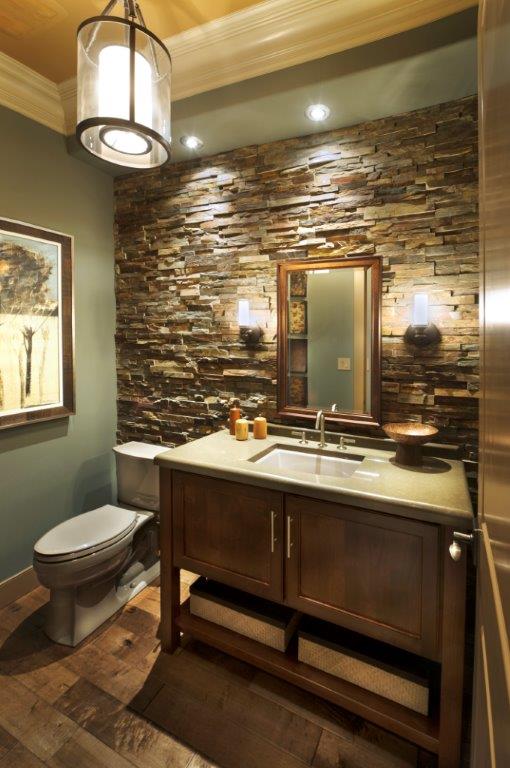 custom cabinets under an elegant and rustic bathroom sink