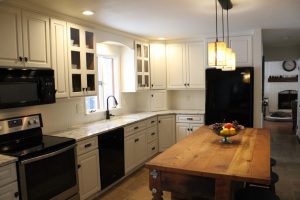kitchen remodel with white cabinetry designed and installed by Creation Cabinetry in Hamburg PA